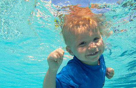 Toddler performing ISR Self Rescue Swimming